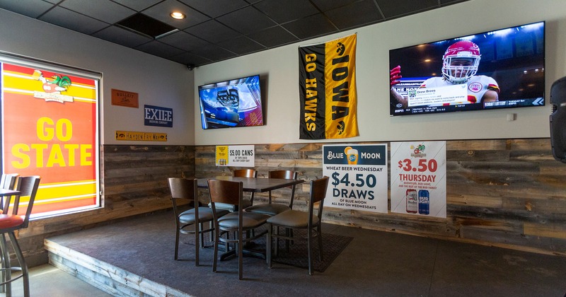 Interior, seating area with TVs