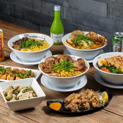 Assorted Japanese dishes and drinks arranged on the table.