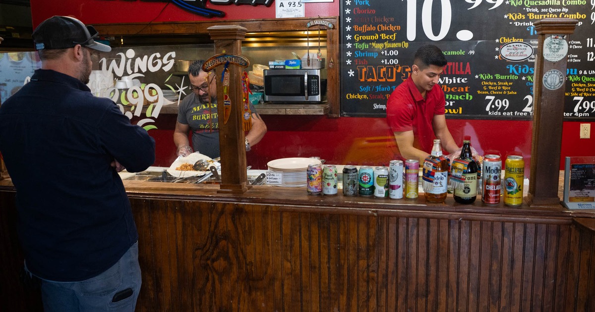 Customer ordering food at the counter