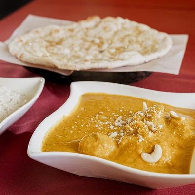 Chicken Korma, served with rice and naan.