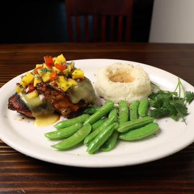 Jerk Chicken, with mango salsa, garlic mashed potatoes, and sugar snap peas.