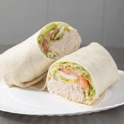 Tuna Wrap, with lettuce, tomatoes, onions, and pickles.