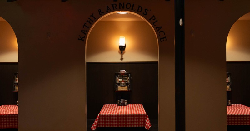 Interior, tables near wall with arches