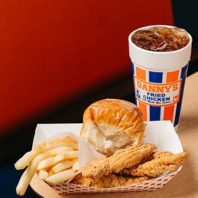 Fried catfish, with fries, bread roll, and soda.