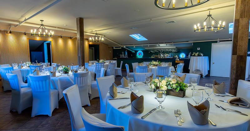 Nicely done event space room with set tables, perfect for any private event, from casual to formal