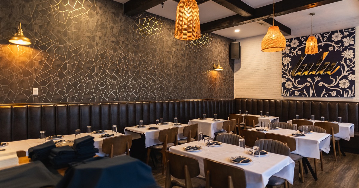 Cozy interior dining area with set tables ready for guests