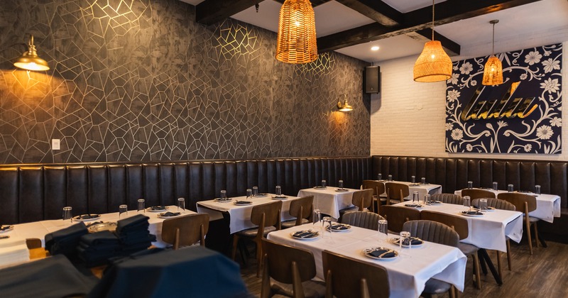 Cozy interior dining area with set tables ready for guests