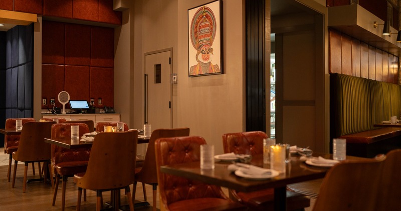 Interior, tables and chairs in dining area