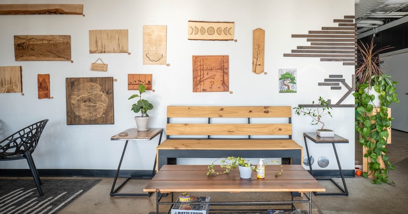 Seating area, bench and coffee tables, wall decorations