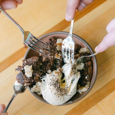 Several forks in a single dessert.