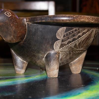 A wooden kava container.