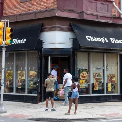 Exterior, entrance door and windows with restaurant's logo