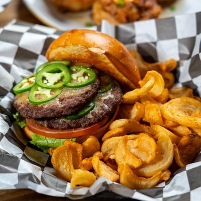 Sweet but sassy smash burger with fries.