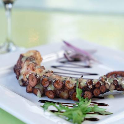 Charbroiled octopus glazed with lemonato sauce