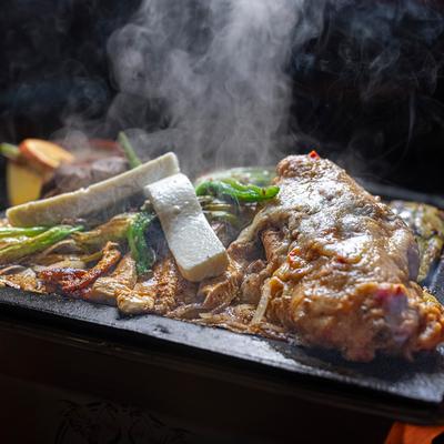 Mixed Mexican barbecue meats.