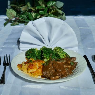 Meatloaf with mushroom gravy, augratin potatoes and buttered broccoli.
