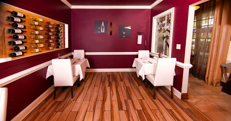 Inside, dining tables, wine shelf, pictures