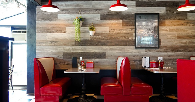 Interior, red and white leather seating and tables