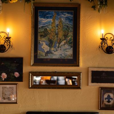 Interior, decorative wall pictures and wall light fixtures.