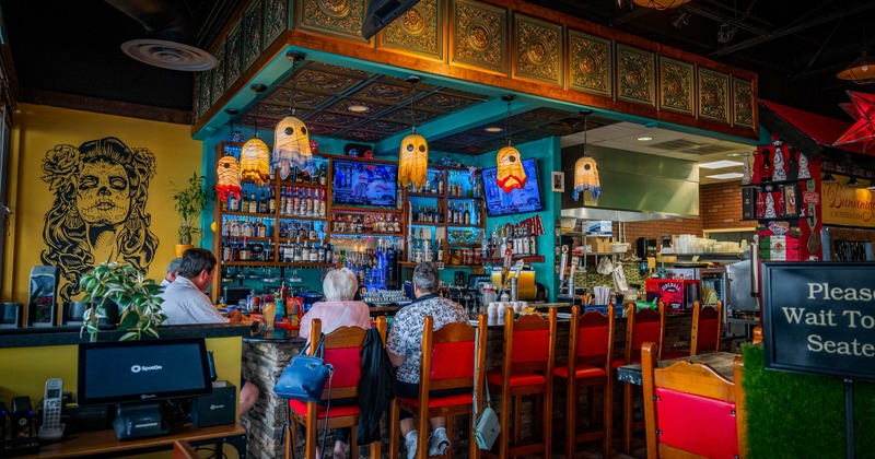 Interior, bar area with guests