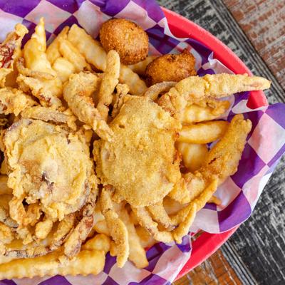 Fried Soft Shell Crab with fries, top view.