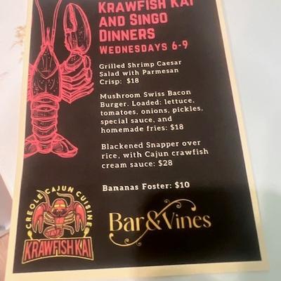 Pamphlet for an event at the bar, with a short menu.