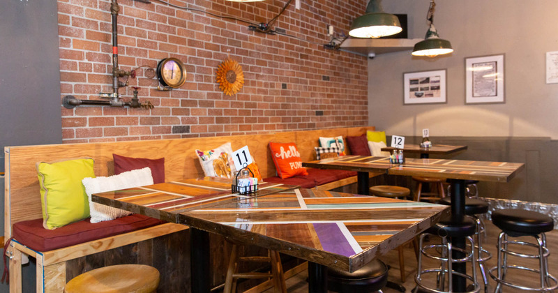 Interior, colorful tables ready for guests