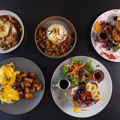 Assorted dishes arranged on a table, top view.