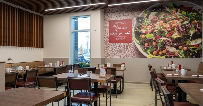 Interior, tables and chairs ready for guests