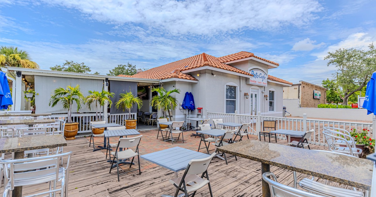 Exterior seating area with chairs and tables