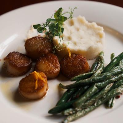 Pan seared scallops, green beans, and mashed potatoes.