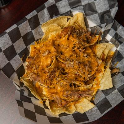 Served loaded nachos.