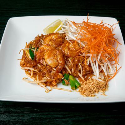 Pad Thai with shrimp on top.