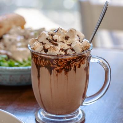 Hot chocolate topped with marshmallows.