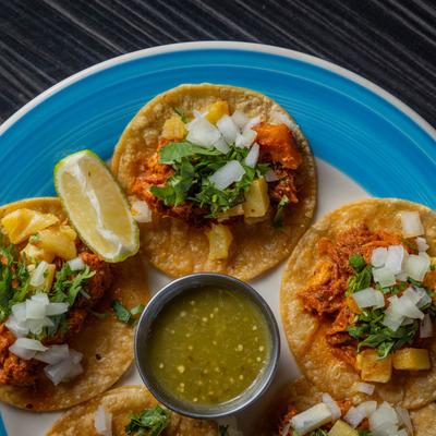 Five bite size Al Pastor tacos topped with pork, cilantro, onions and fresh pineapple.