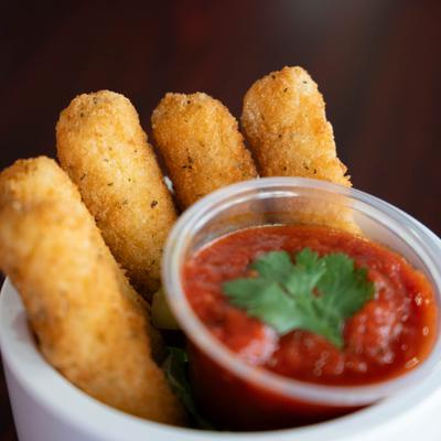 Mozzarella sticks, with marinara sauce.