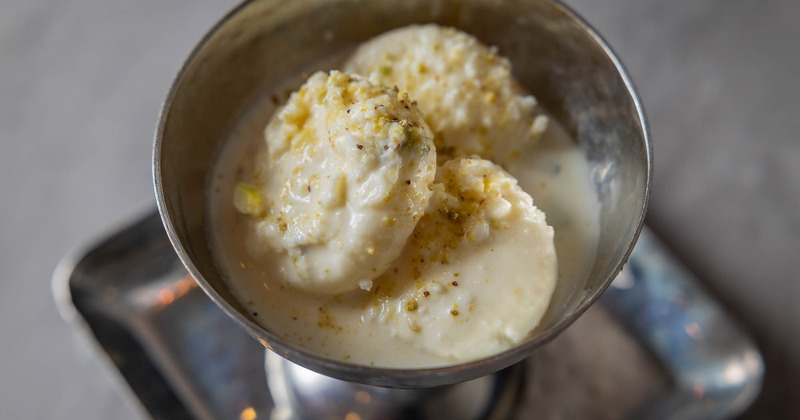 Soft cheese patties soaked in sweet saffron milk