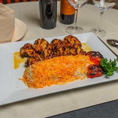 Ground chicken kebab served with flame-broiled tomatoes and basmati saffron rice.