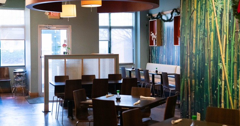 Interior, dining area, tables for for and six, ready for guests, restaurant entrance