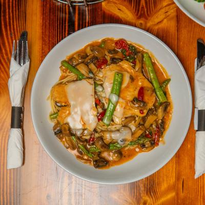 Chicken breast with mushrooms, tomatoes, asparagus, garlic, marinara, and mozzarella.