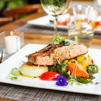 Grilled fish and decorated salad