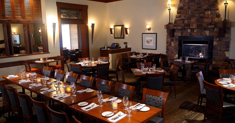 Interior, seating area with a firepit on the right