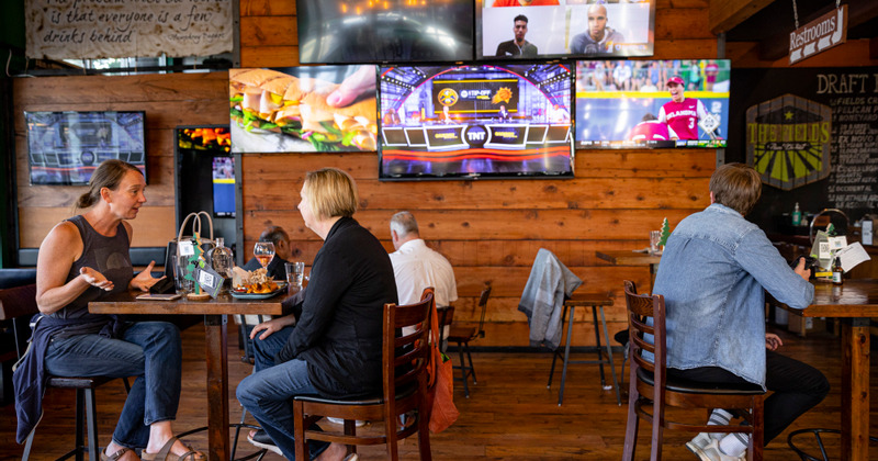 Guests enjoying food and drinks