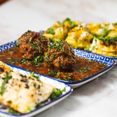 Samosa, kofta, and mantu dumpling plates.