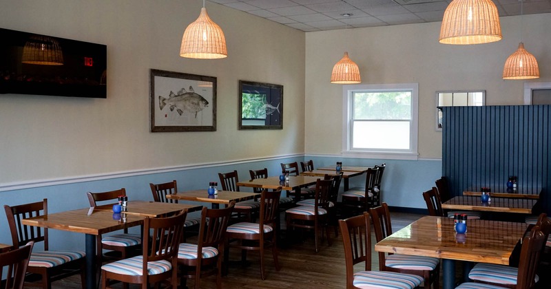 Interior, seating area, tables ready for guests