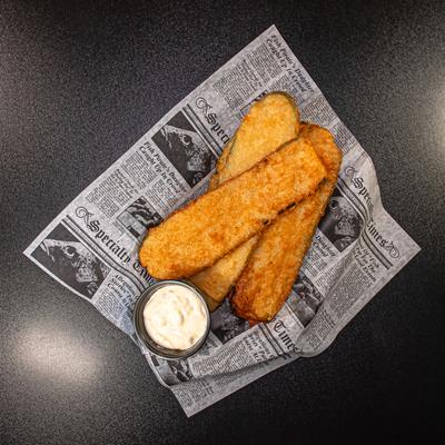 Zucchini Planks served with a dipping sauce.
