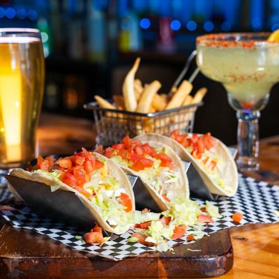 Tacos, fries, and drinks.