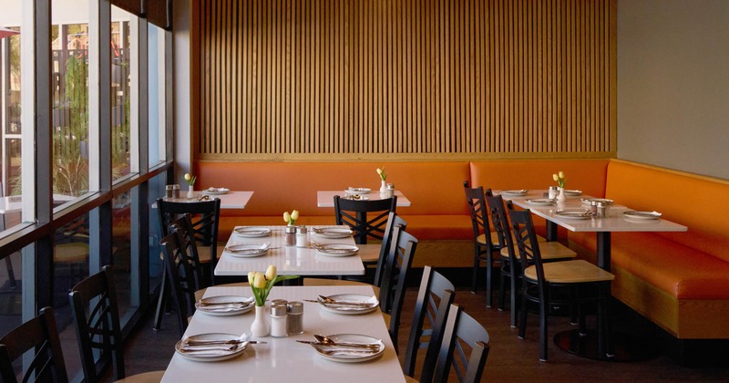Interior, tables ready for guests