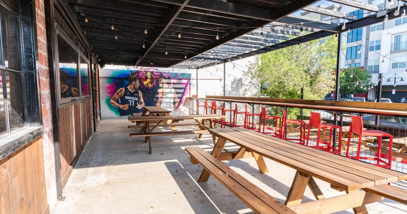 Exterior, conjoined tables and bench seating, long bar table with chairs