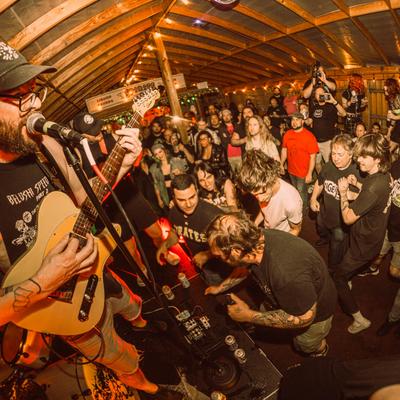 Interior, crowd of people enjoying a gig
